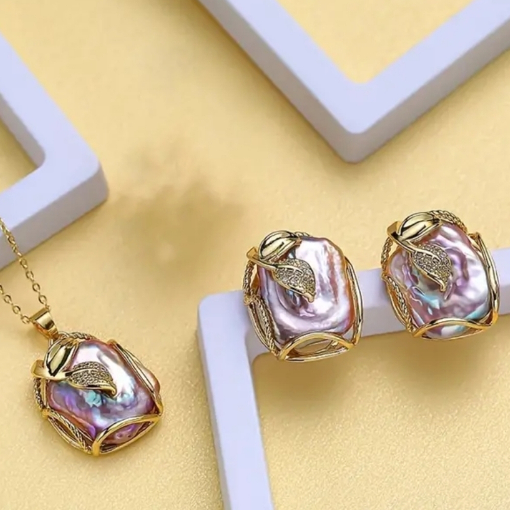 Three Pieces Natural Baroque Freshwater Pearl Set in a Stainless Steel Chain.